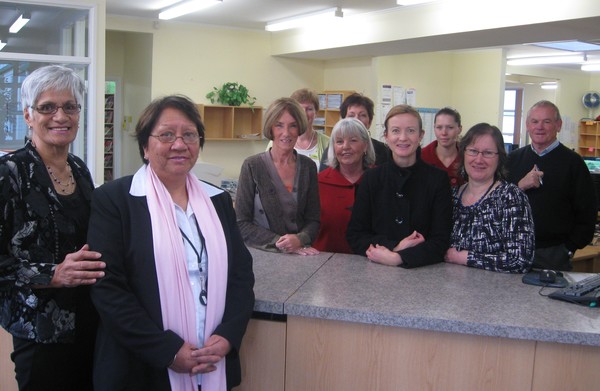 Ellen Kinred (left) and Mandy Wilson with the Information Services team at the old public counter.